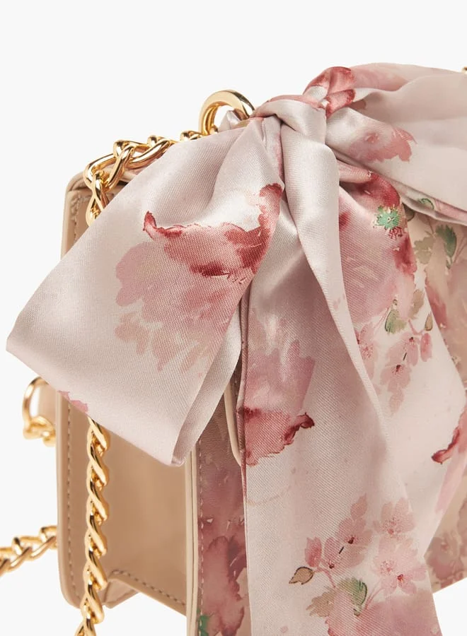 فلورا بيلا من شو إكسبرس Womens Floral Print Crossbody Bag With Scarf Accent And Magnetic Button Closure