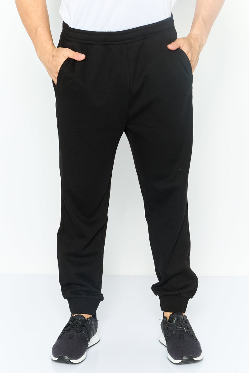 PUMA Men Sportswear Fit Outdoor Sweatpants, Black  - Image 1