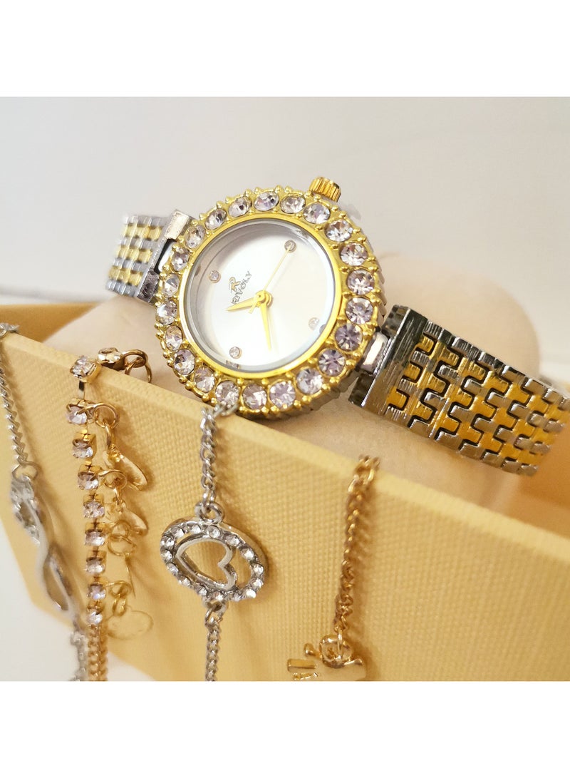 ريفولي طقم نسائي يتكون من ساعة ومجموعة اساور نواعم من الستانلس ستيل - Image 2
