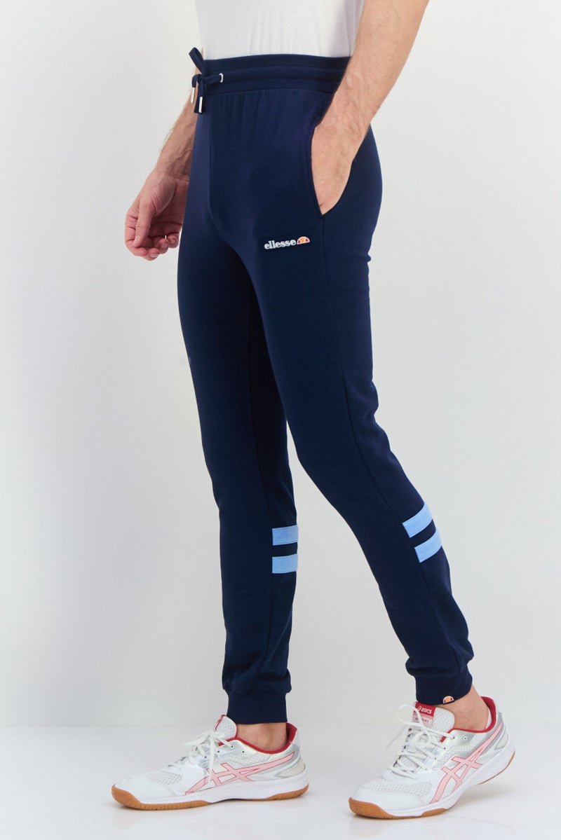 Ellesse سروال رياضي مزخرف بشعار للرجال بتصميم عادي، أزرق داكن - Image 2