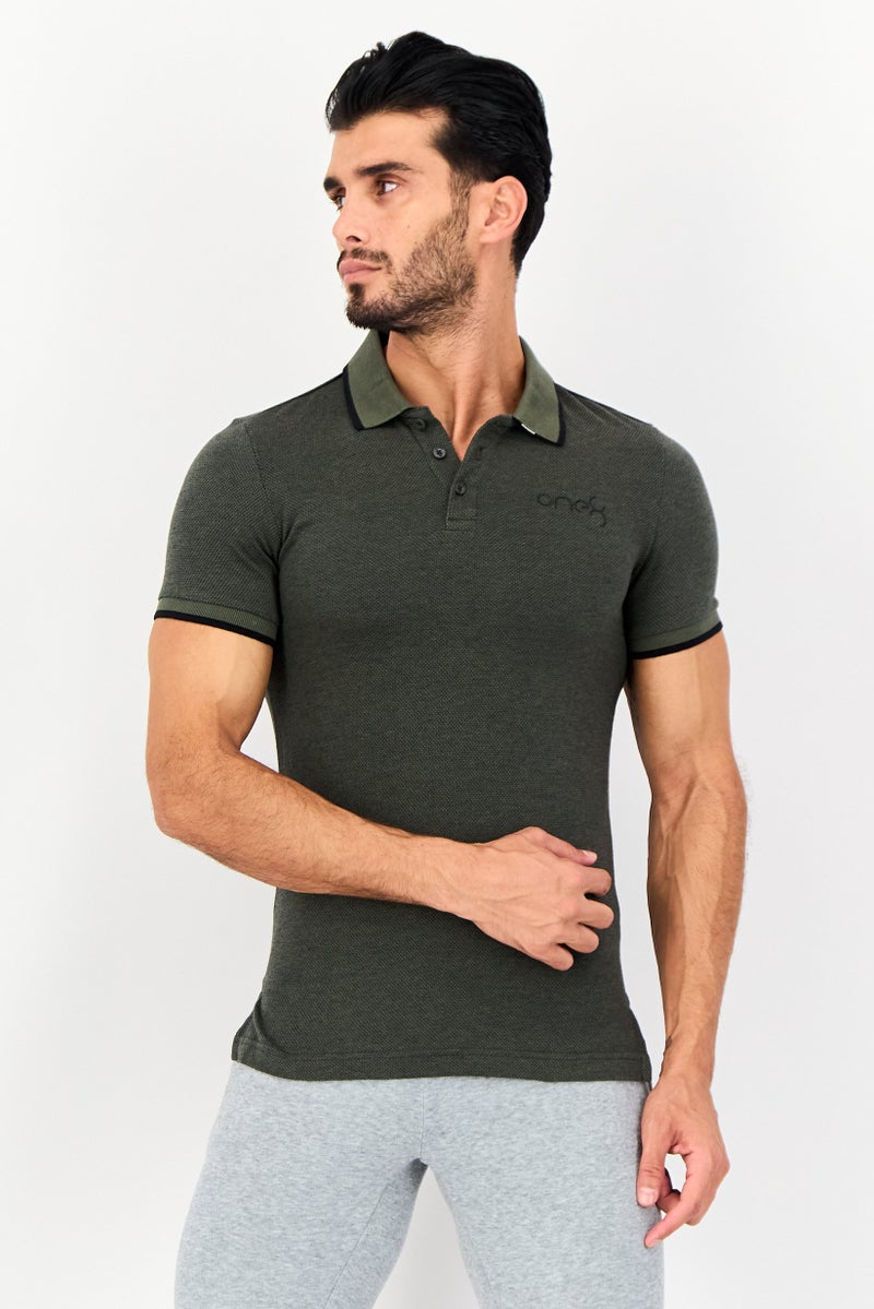 PUMA قميص بولو قصير الأكمام للرجال من بومة x One8، لون أخضر عسكري - Image 1