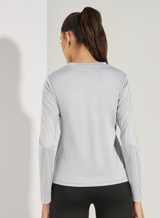 ستايلي اكتيف توب أساسي بأكمام طويلة وتفاصيل شعار - Image 5