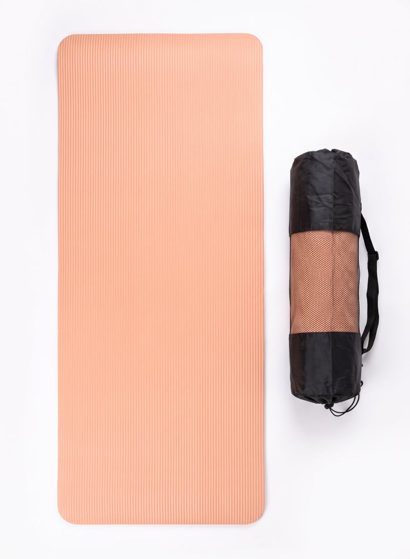 Non-Slip Thick Yoga and Fitness Exercise Mat with Mesh Carry Bag Peach - Image 1