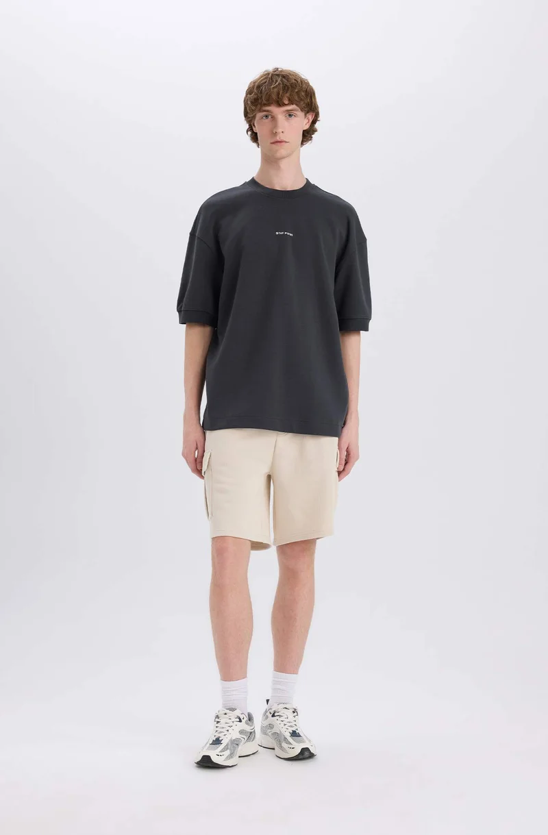 ديفاكتو Loose Fit Crew Neck Printed Short Sleeve T-Shirt