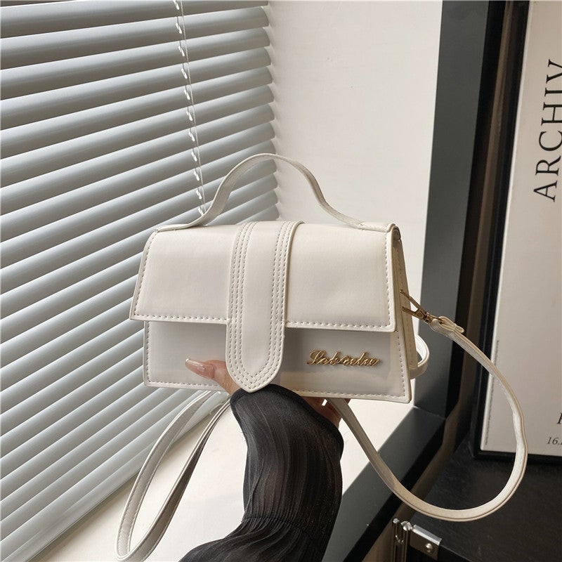 Simple And Elegant Solid Color New Spring Casual Handbag For Women, Niche New Textured Crossbody Bag In White - Image 2