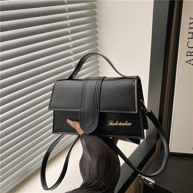 Simple And Elegant Solid Color New Spring Casual Handbag For Women, Niche New Textured Crossbody Bag In White - Image 1