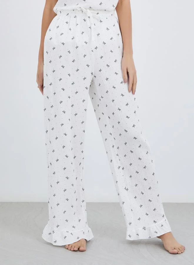 Styli Styli All-Over Bow Print Cotton Gauze Ruffle Hem Cami and Pyjama Set