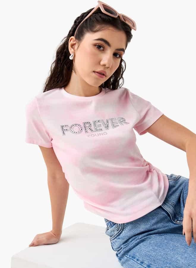 تواكستريمز تيشيرت بياقة دائرية وطبعات جرافيك وأكمام قصيرة - Image 1