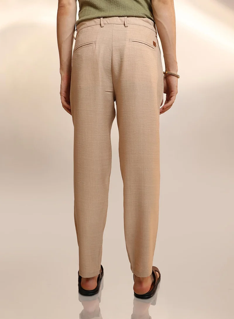 Campus Sutra  Men's Saltbox Beige Solid Pleated Trousers for Men | Best Price UAE