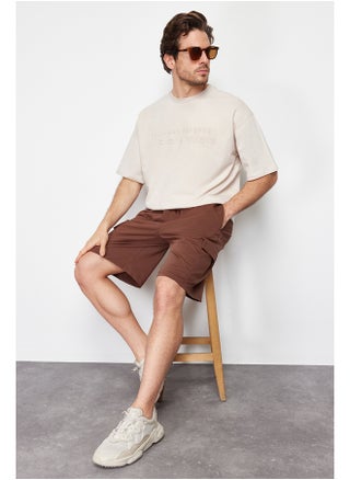 Brown Oversize/Wide-Fit Concealed Cord Elastic Waist Cargo Pocket Tag Shorts TMNSS24SR00018 - pzsku/ZE158A076E5BA7BB804B4Z/45/_/1730940043/0d47316f-62d2-4156-a2d6-ed15c0dbe697