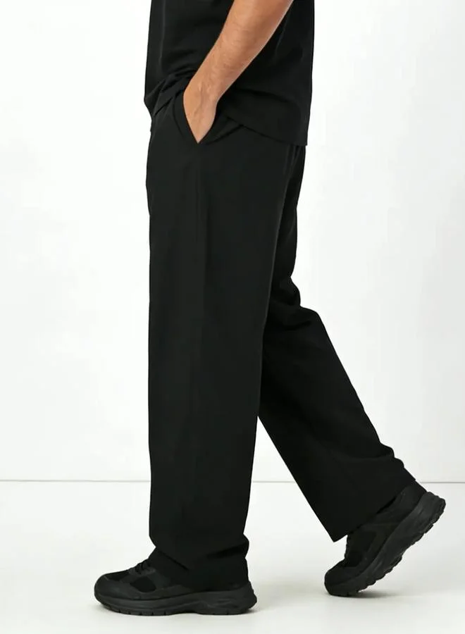 تايك تو Men Black Solid Relaxed Fit Trousers