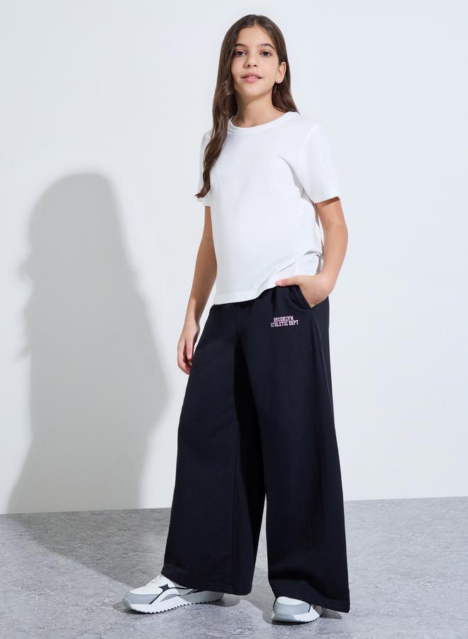 Styli Teen Girls Black Slogan Print Wide Leg Pants - Image 2