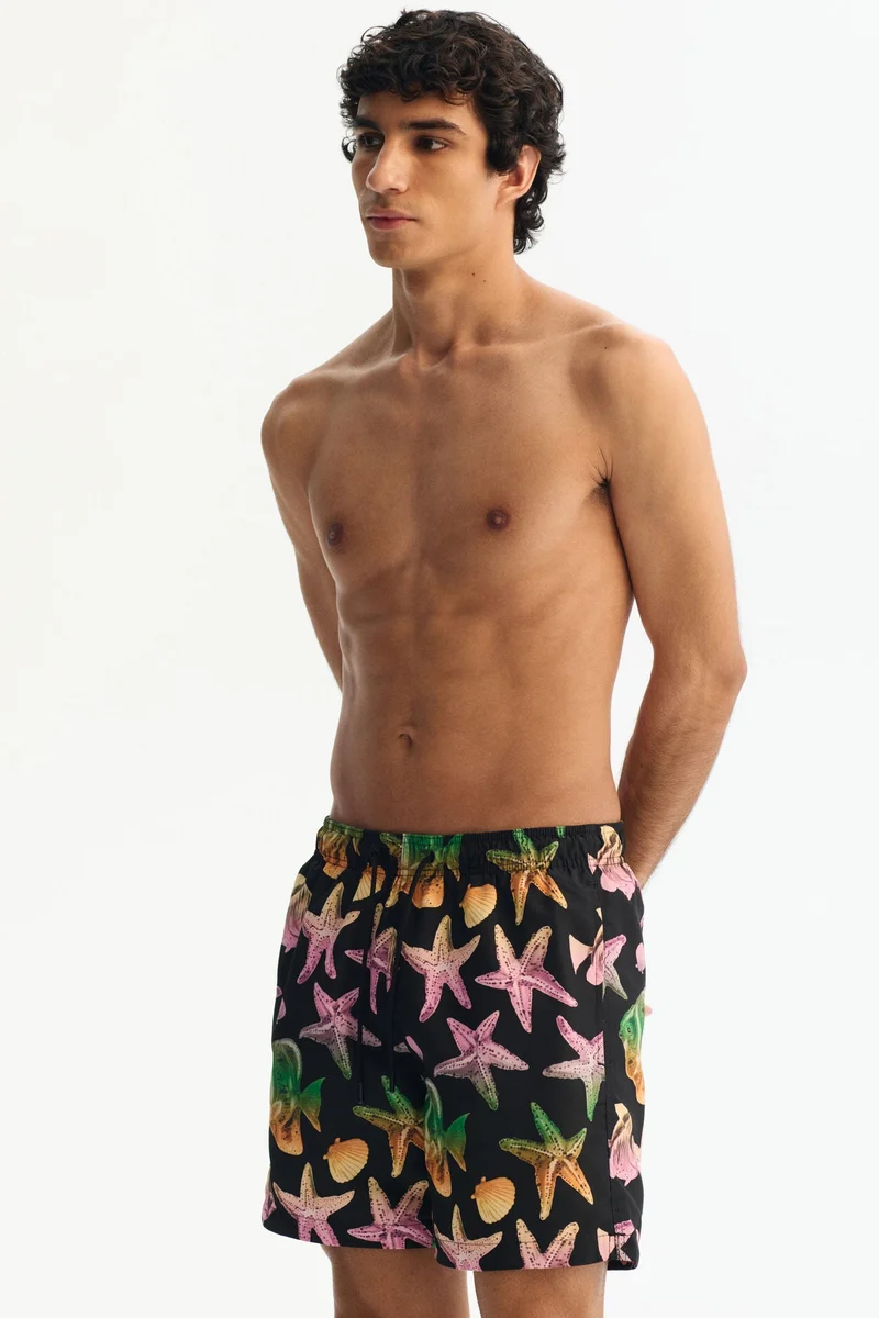 Patterned swim shorts