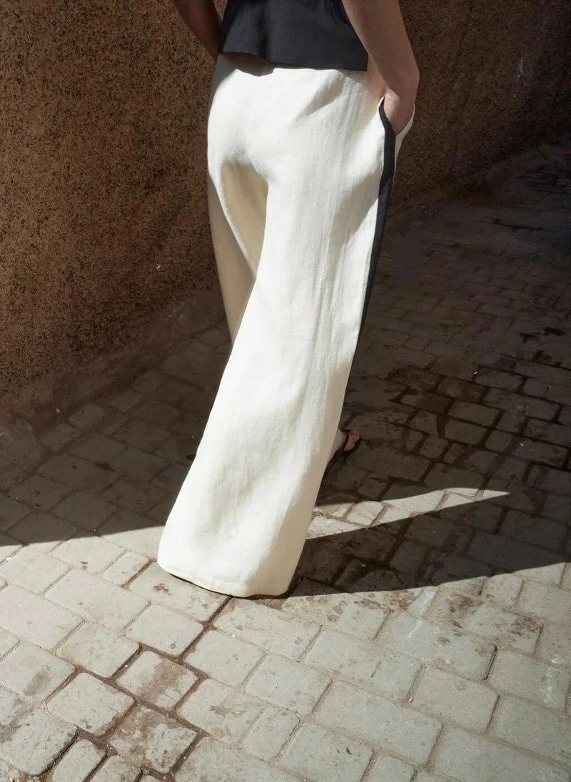 مانجو Contrast stripe linen trousers