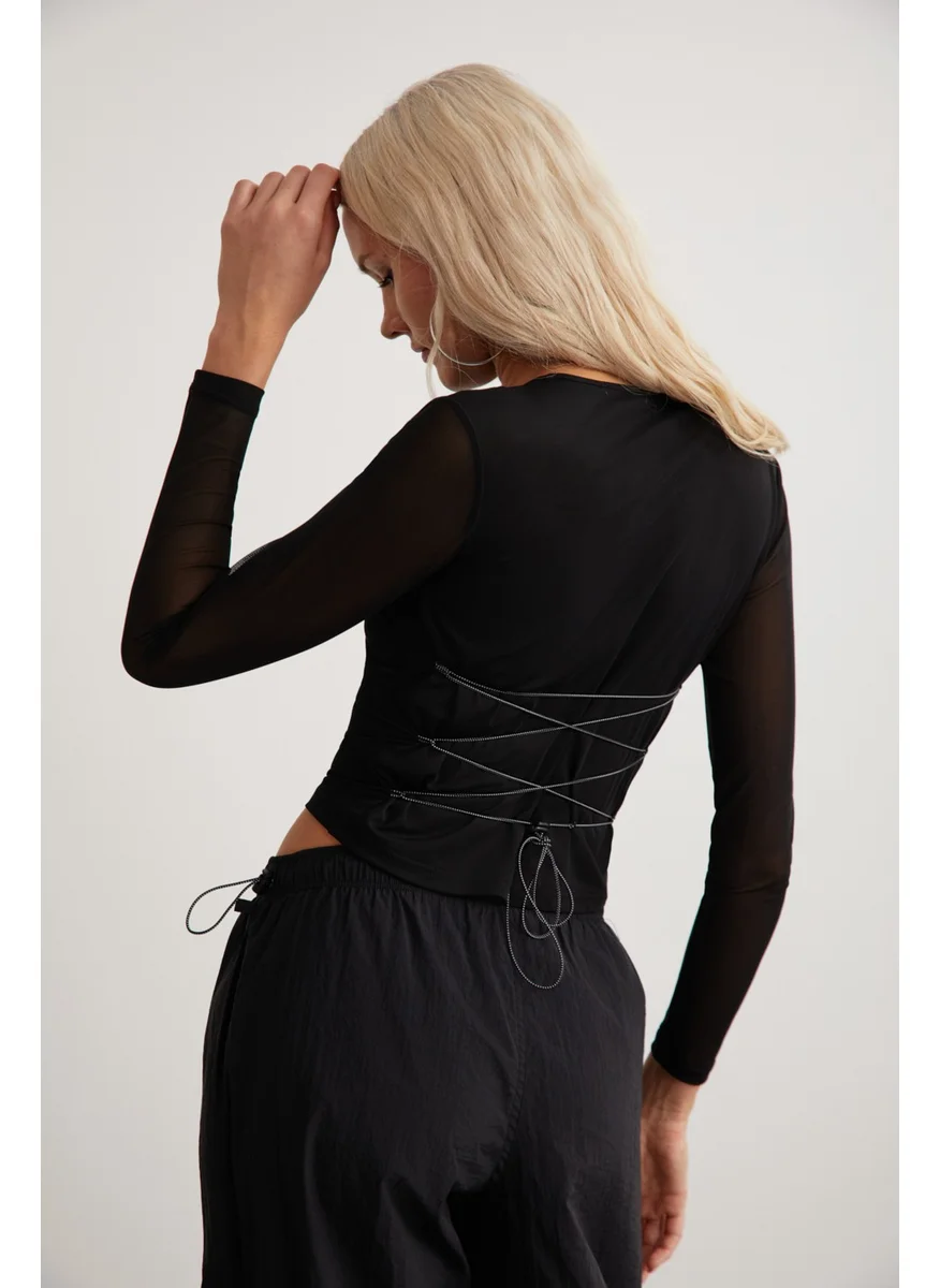 جريميلانج Derry Women's Crew Neck Back Tie Detail Tulle Crop Black Blouse