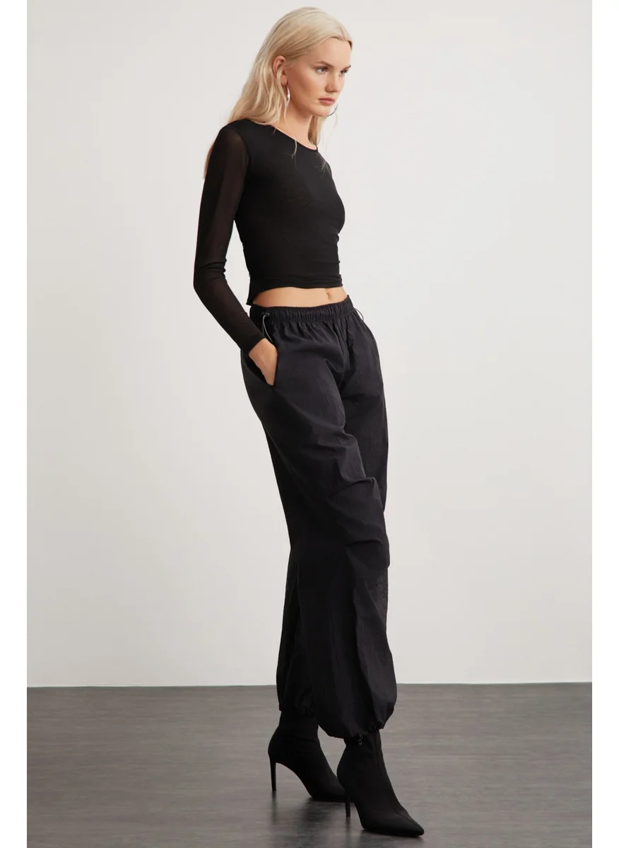 جريميلانج Derry Women's Crew Neck Back Tie Detail Tulle Crop Black Blouse