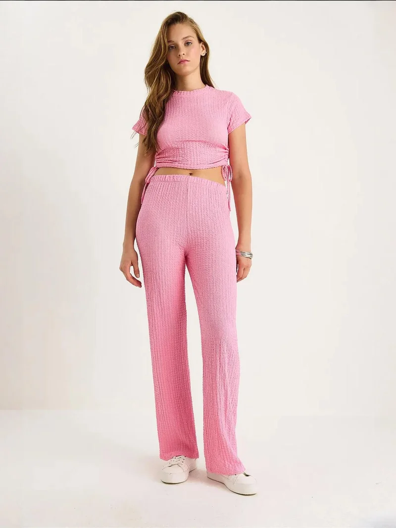 بيانكو لوتشي طقم لوكسي قطعتين بقصة ضيقة وملمس مميز