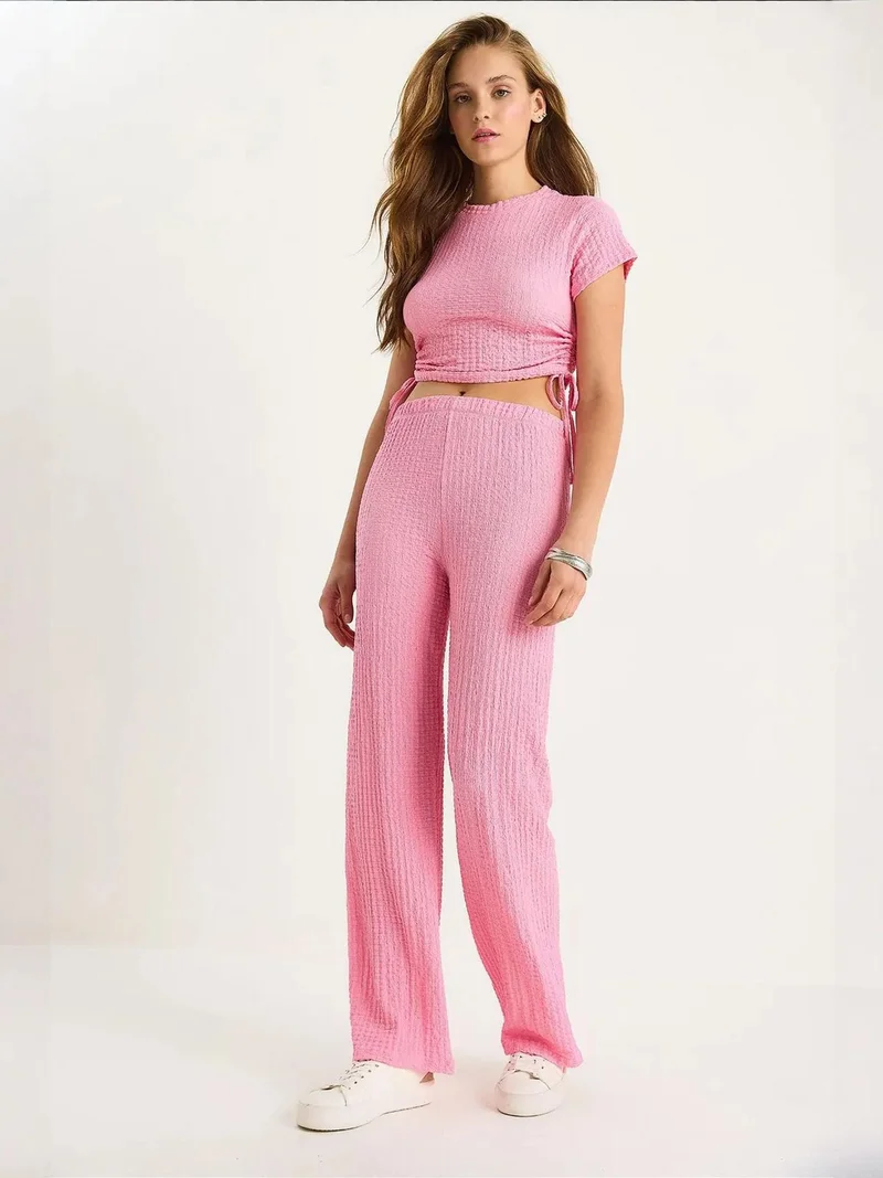 بيانكو لوتشي طقم لوكسي قطعتين بقصة ضيقة وملمس مميز