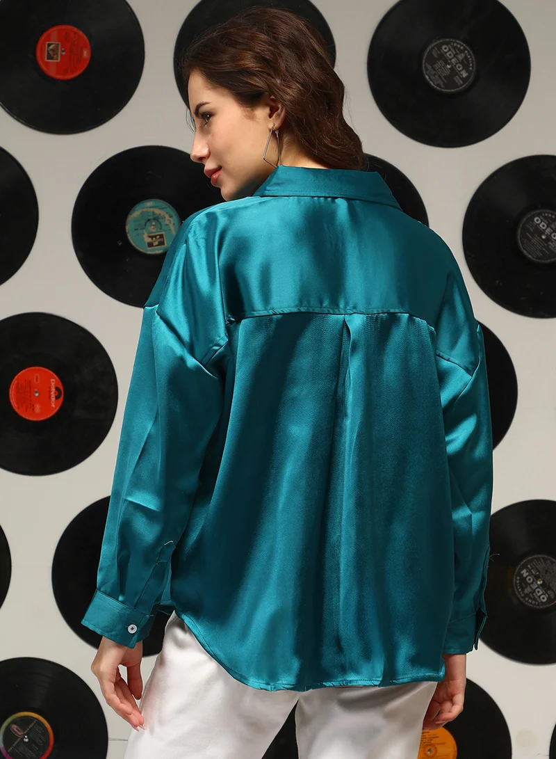 Campus Sutra Women's Teal Green Satin Oversized Shirt For Casual Wear | Spread Collar | Long Sleeves | Button Closure | Oversized Shirt Crafted With Comfort Fit For Everyday Wear