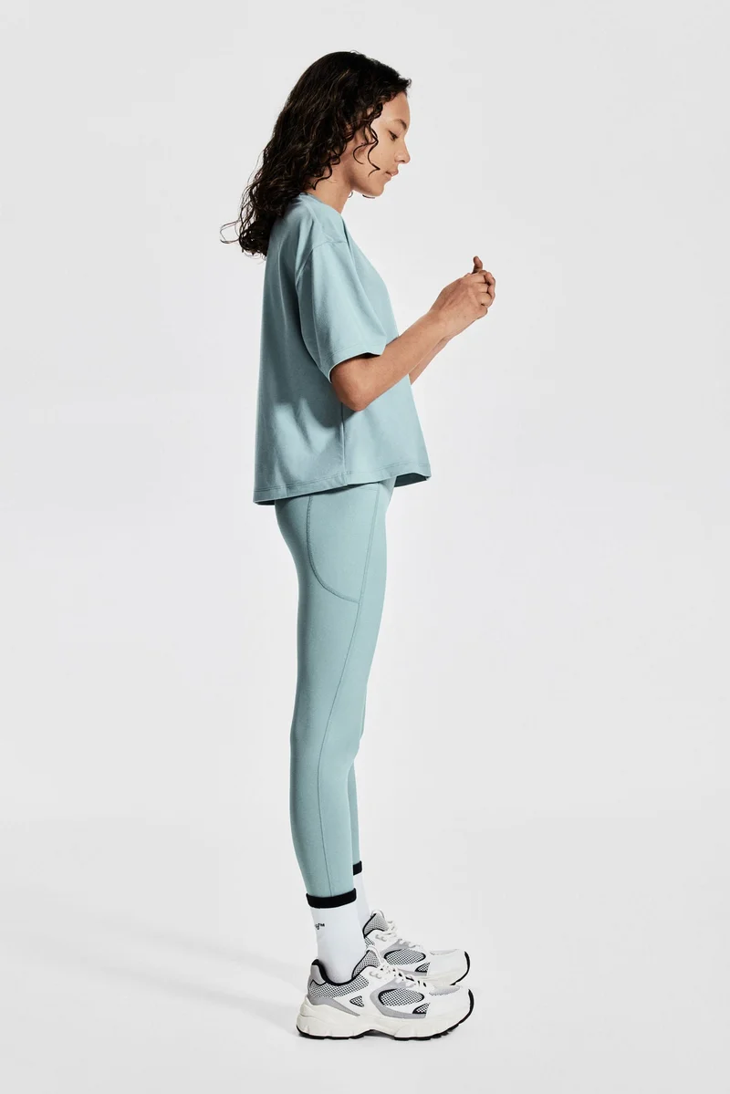 H&M Boxy-style sports top with DryMove™