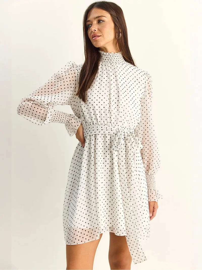 بيانكو لوتشي LUCCI Polka Dot Half Turtleneck Mini Dress with Belt