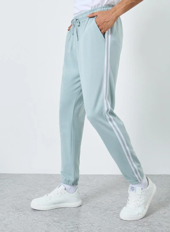 Styli Men Slim Fit Terry Joggers with Side Taping