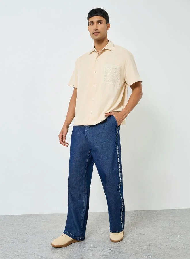 ستايلي قميص بتفاصيل جيب كروشيه