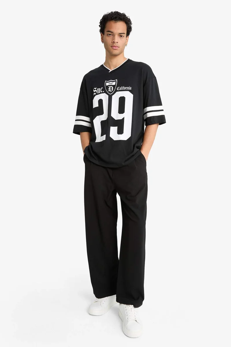 ديفاكتو Loose Fit Crew Neck Short Sleeve T-Shirt