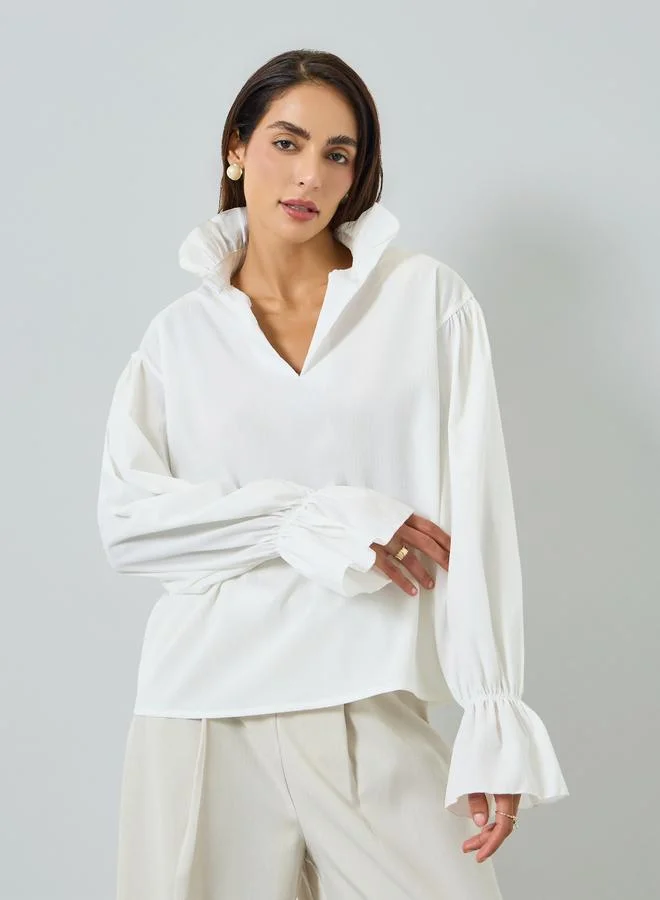 تايك تو بلوزةة بيضاء طويلة بتفاصيل كشكش