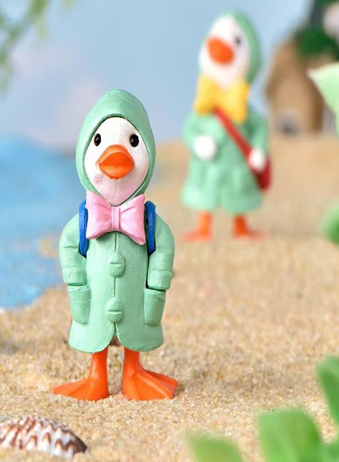 ALHBEJT 4Pcs Duck Statue for Holding Umbrella Home Decor Little Duck in Raincoat Resin Sculptured Hand Painted Figurine Cute Animal Sculptures and Statues (Green) - Image 4