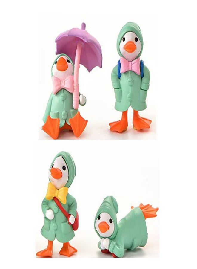 ALHBEJT 4Pcs Duck Statue for Holding Umbrella Home Decor Little Duck in Raincoat Resin Sculptured Hand Painted Figurine Cute Animal Sculptures and Statues (Green) - Image 1