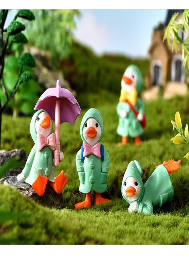 ALHBEJT 4Pcs Duck Statue for Holding Umbrella Home Decor Little Duck in Raincoat Resin Sculptured Hand Painted Figurine Cute Animal Sculptures and Statues (Green) - Image 5