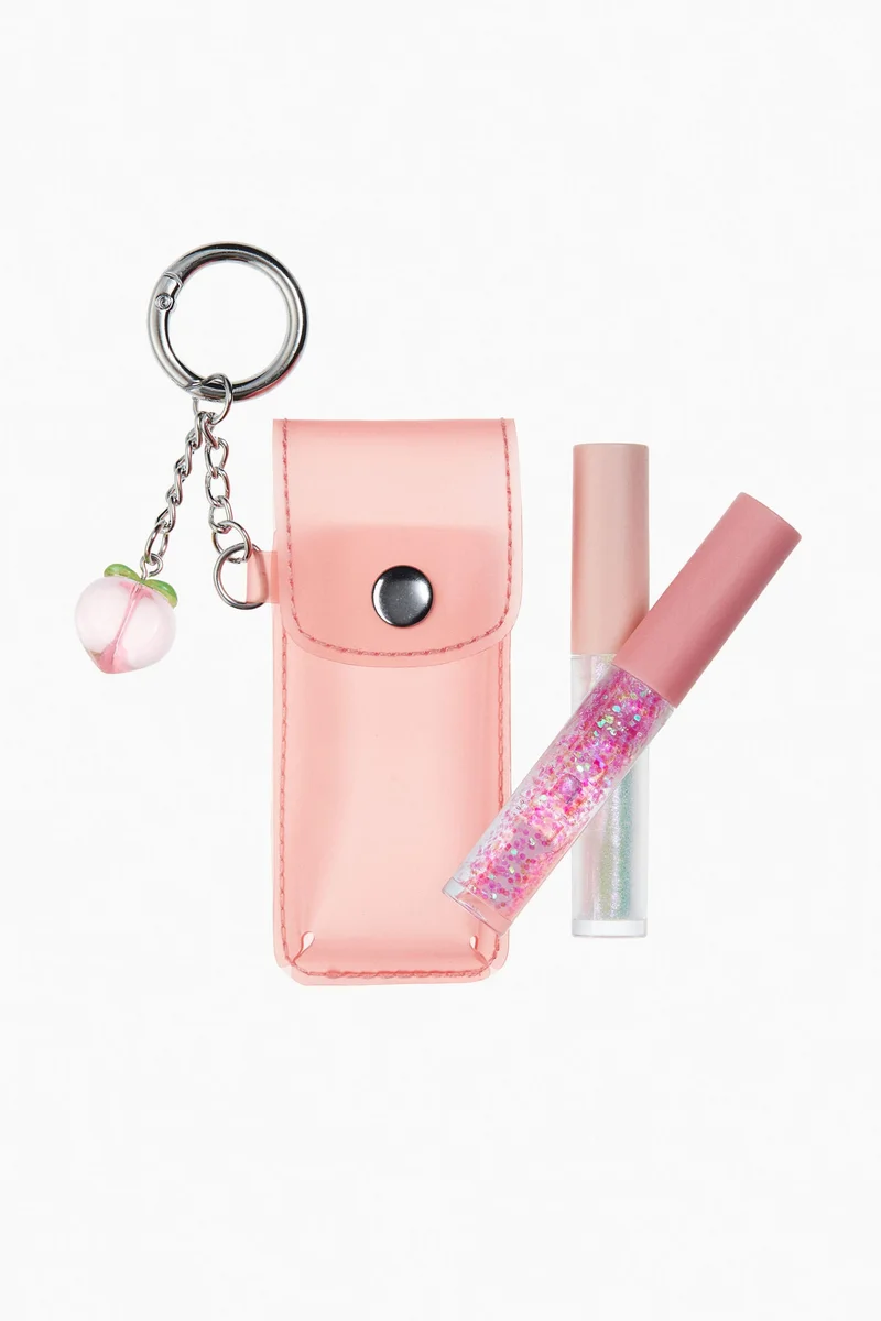 اتش اند ام علاّقة مفاتيح بملمع شفاه