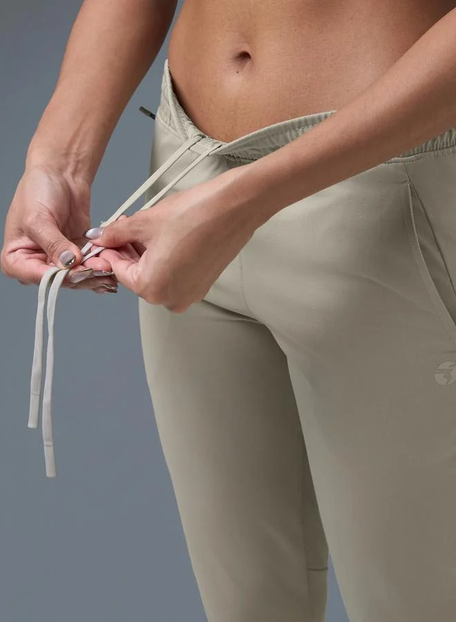 Technosport Beige Solid Straight Fit Trackpants for Women | Best Price UAE