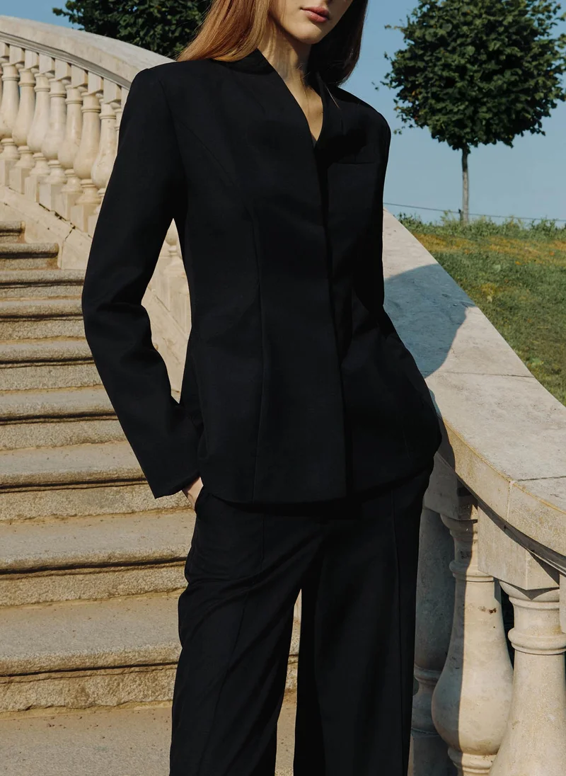 Fitted jacket with high collar