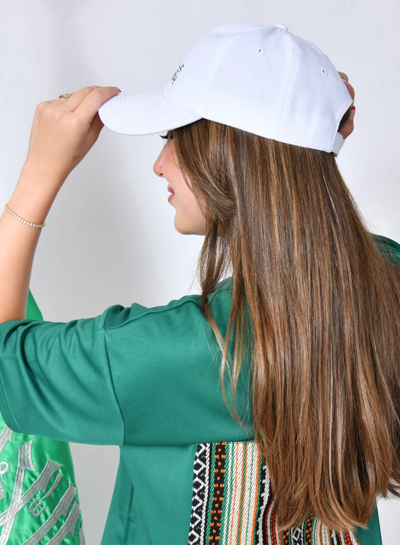 HAWRAA ABAYA White cap with the slogan "Our pride is our vision" embroidered on it (for adults and children)
