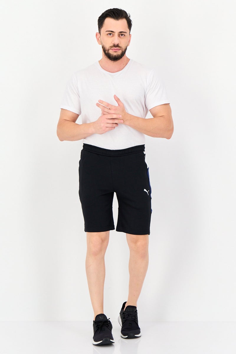 PUMA شورتات خارجية للرجال بقصة ضيقة بشعار العلامة التجارية، أسود - Image 4