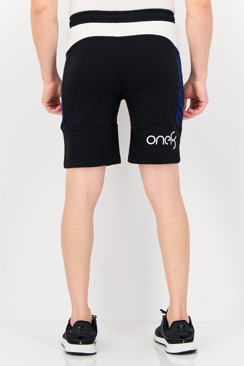 PUMA شورتات خارجية للرجال بقصة ضيقة بشعار العلامة التجارية، أسود - Image 3