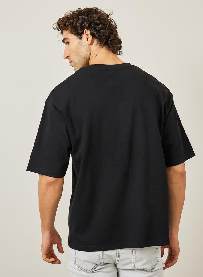 Styli Oversized Embroidered Slogan Interlock T-Shirt - Image 4