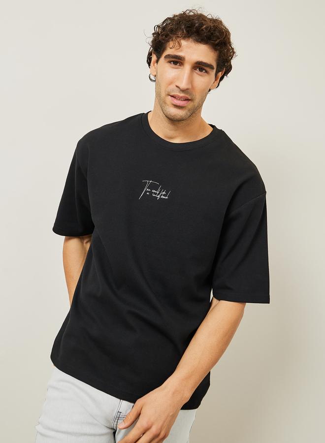 Styli Oversized Embroidered Slogan Interlock T-Shirt - Image 1