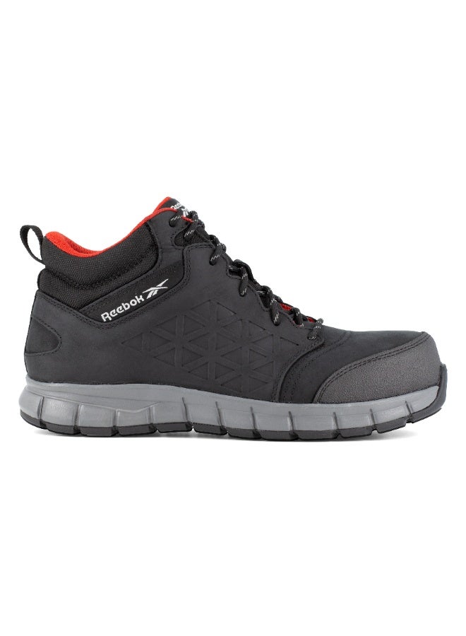 Reebok Work إكسل لايت | IB1037-1S3 – أسود، حذاء سلامة قصّة متوسطة بمقدمة ألومنيوم وجلد مقاوم للماء ونعل مقاوم للانزلاق SRC - Image 1