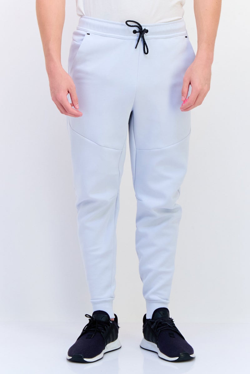 Nike Men Slim Fit Drawstring Outdoor Track Pants, Baby Blue - Image 1