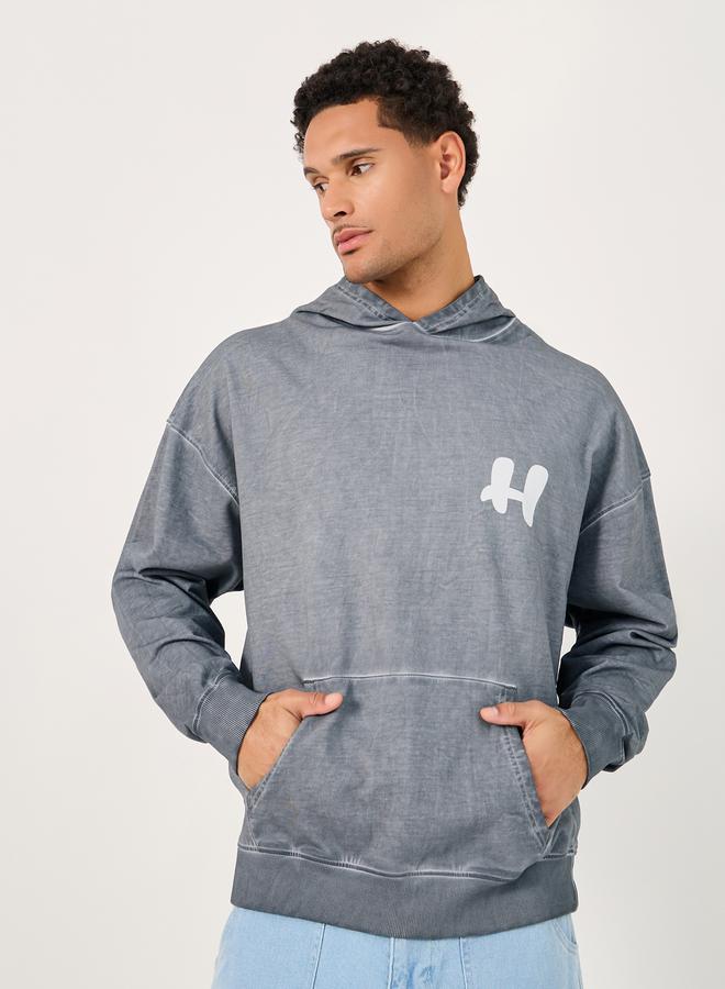 Styli Acid Washed Graphic Print Oversized Hoodie - Image 1