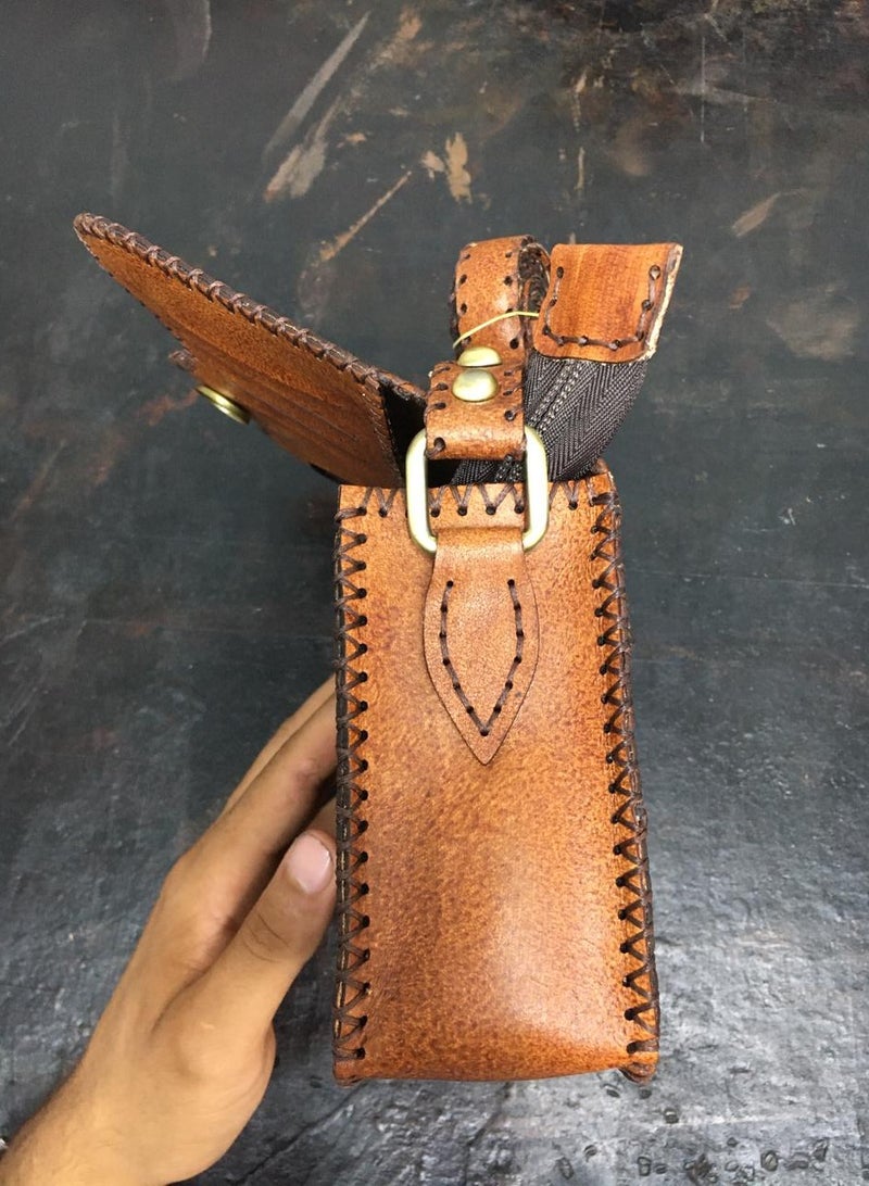 🎒 Handmade Genuine Leather Crossbody Bag – Small but Super Stylish 100% handcrafted genuine leather 3 zippered compartments for smart organization Magnetic clasp for easy and secure closure Includes built-in card slots Comes with handle + adjustable crossbody strap Size: 22×18 cm – perfect for daily use or casual outings 🛍️ Available now on Noon  From Real leather. Real craftsmanship. - Image 3