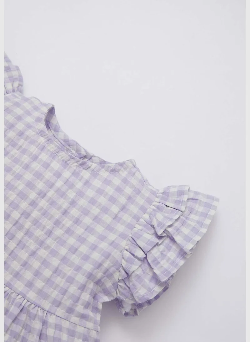 ديفاكتو Sleeveless Frill Detail Check Print Mini Dress