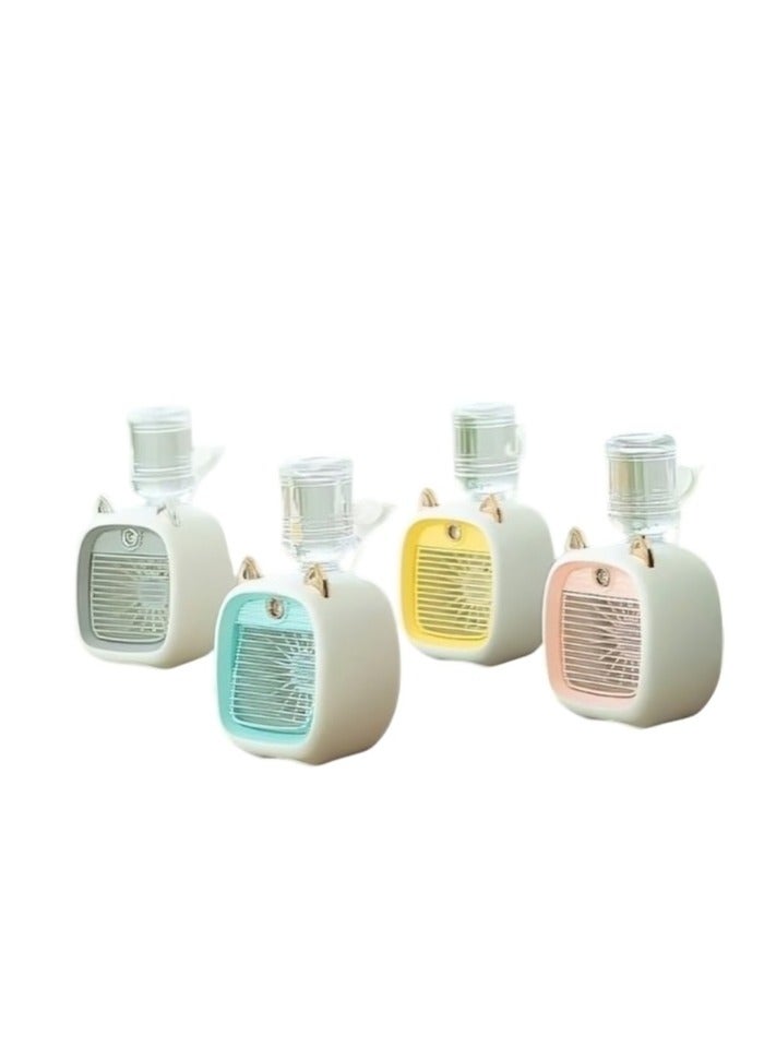 Small desk fan with a bottle for adding water and perfume - multi-colored