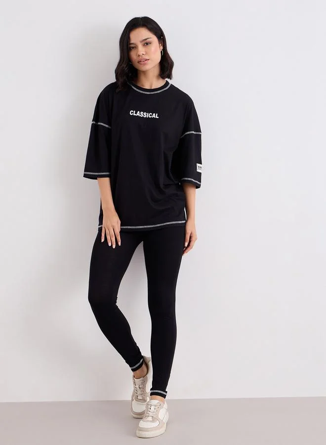Styli Styli Women Black Overlock Seam Oversized T-Shirt and Leggings Co-Ords