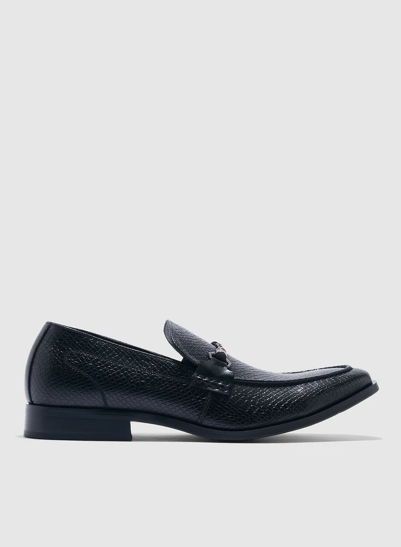 Robert Wood Snake Print Slip Ons