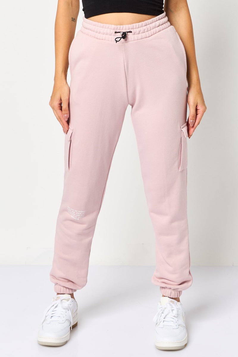 Nike Women Standard Fit Outdoor Sweatpants, Light Pink - Image 1