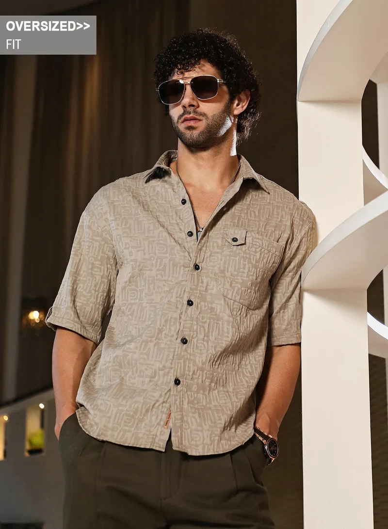 Campus Sutra Campus Sutra Men's Ash Beige Aztec-Tactile Oversized Shirt For Casual Wear | Cuban Collar | Short Cuffed Sleeves | Button Closure | Oversized Shirt Crafted With Comfort Fit For Everyday Wear